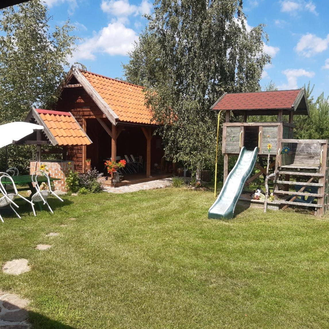 Domek W Kwiatach Zyndaki Esterno foto